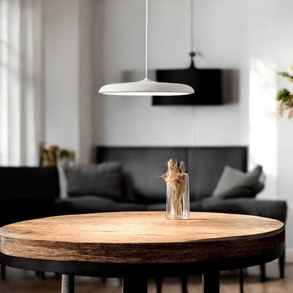 Scandinavian-style LED pendant lamp with adjustable cable, featuring a sleek aluminum design, perfect for illuminating kitchen and dining areas. 0