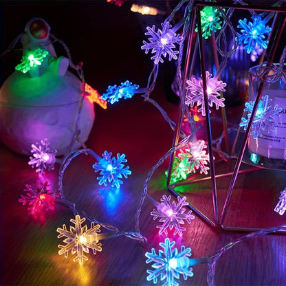 LED Snowflake String Lights featuring three vibrant color options and available in multiple lengths, perfect for festive decorations and winter-themed displays. 1