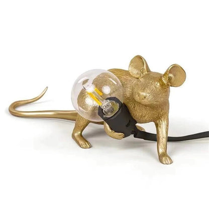 LED table lamp featuring a unique mouse design, crafted from durable white resin, providing warm lighting perfect for modern bedside or desk use. 6