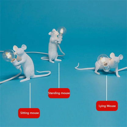 LED table lamp featuring a unique mouse design, crafted from durable white resin, providing warm lighting perfect for modern bedside or desk use. 5