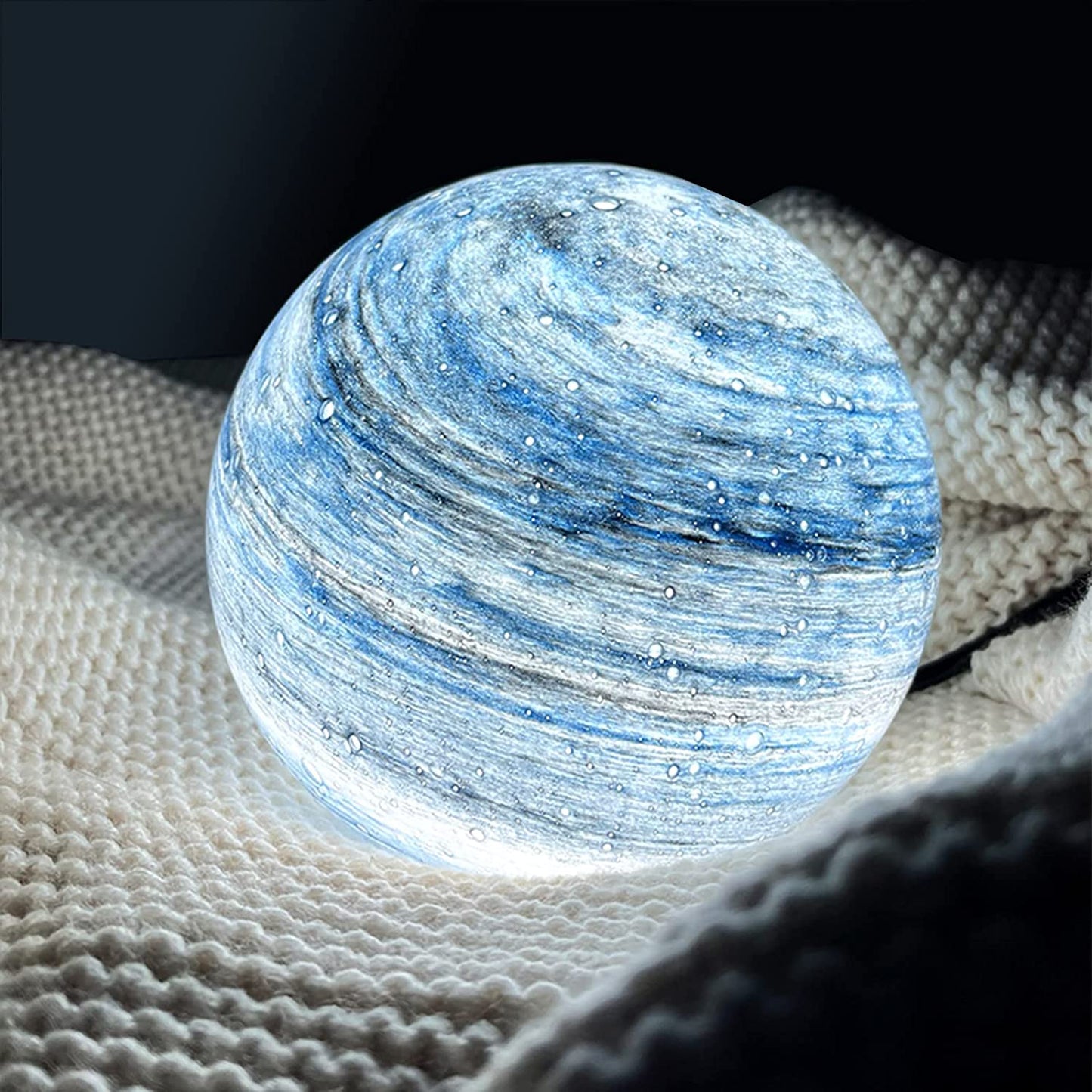 LED table lamp featuring a unique swirl pattern and soft glow, designed with an elegant glass-look finish, perfect for bedside or desk use. 5