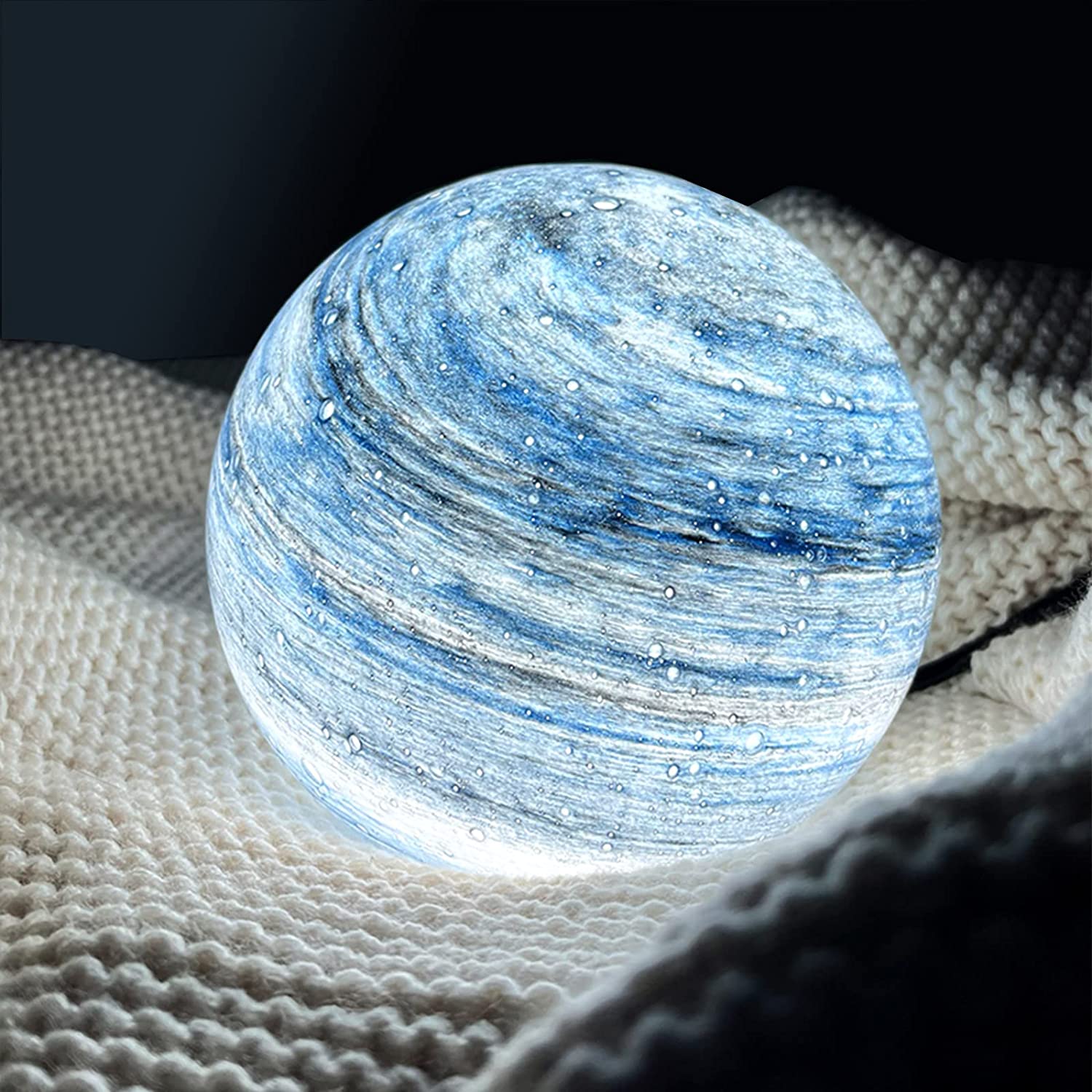LED table lamp featuring a unique swirl pattern and soft glow, designed with an elegant glass-look finish, perfect for bedside or desk use. 5