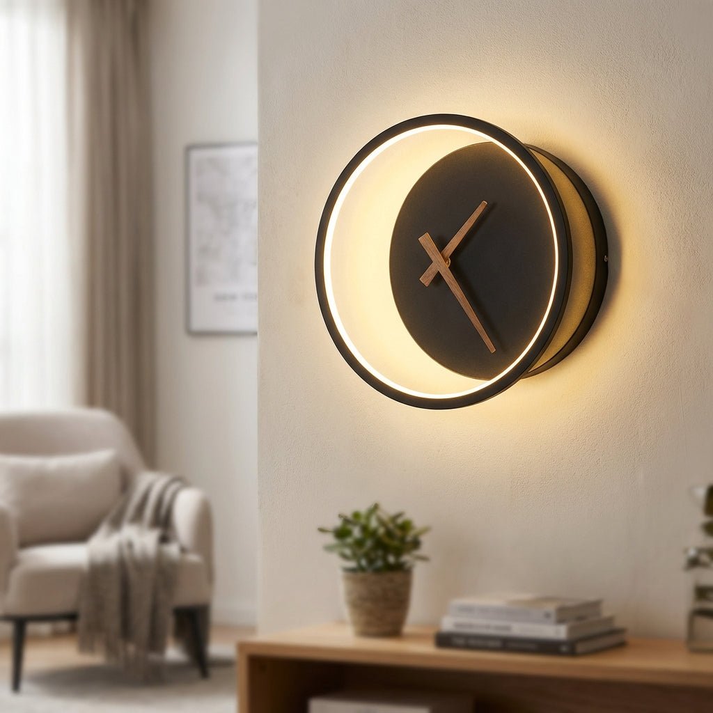 Modern minimalist LED wall clock featuring integrated warm white lighting, measuring 27x25cm, perfect for stylish home decor. 1