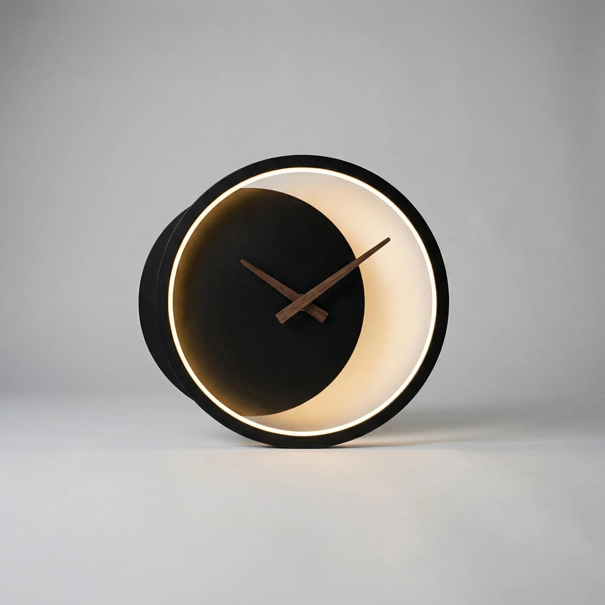 Modern minimalist LED wall clock featuring integrated warm white lighting, measuring 27x25cm, perfect for stylish home decor. 4