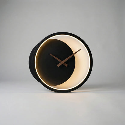 Modern minimalist LED wall clock featuring integrated warm white lighting, measuring 27x25cm, perfect for stylish home decor. 4