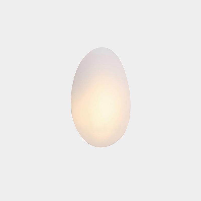 LED wall lamp featuring an adjustable light color, designed with a sleek oval shape in metal and glass, perfect for modern home decor. 0