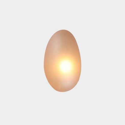 LED wall lamp featuring an adjustable light color, designed with a sleek oval shape in metal and glass, perfect for modern home decor. 21