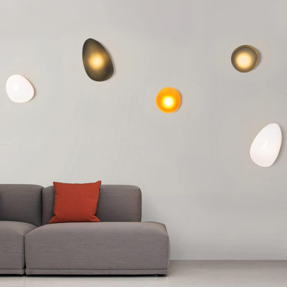 LED wall lamp featuring an adjustable light color, designed with a sleek oval shape in metal and glass, perfect for modern home decor. 8