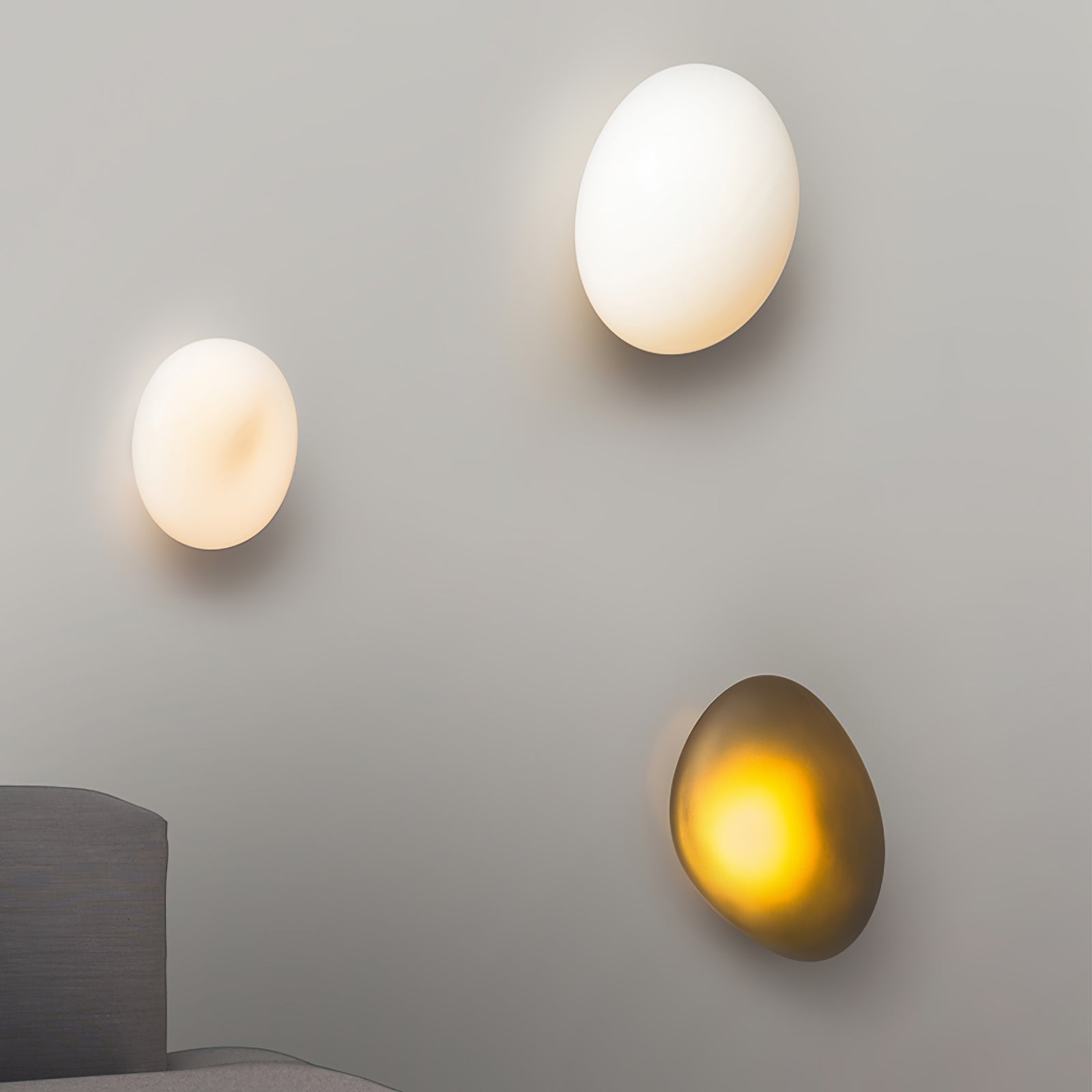 LED wall lamp featuring an adjustable light color, designed with a sleek oval shape in metal and glass, perfect for modern home decor. 5