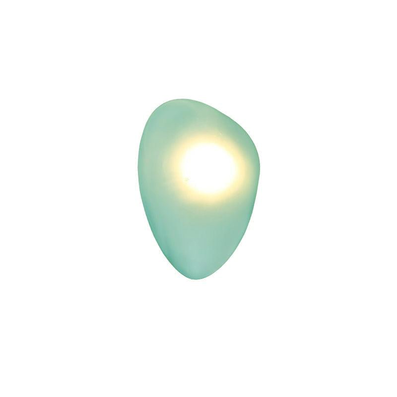LED wall lamp featuring an adjustable light color, designed with a sleek oval shape in metal and glass, perfect for modern home decor. 18