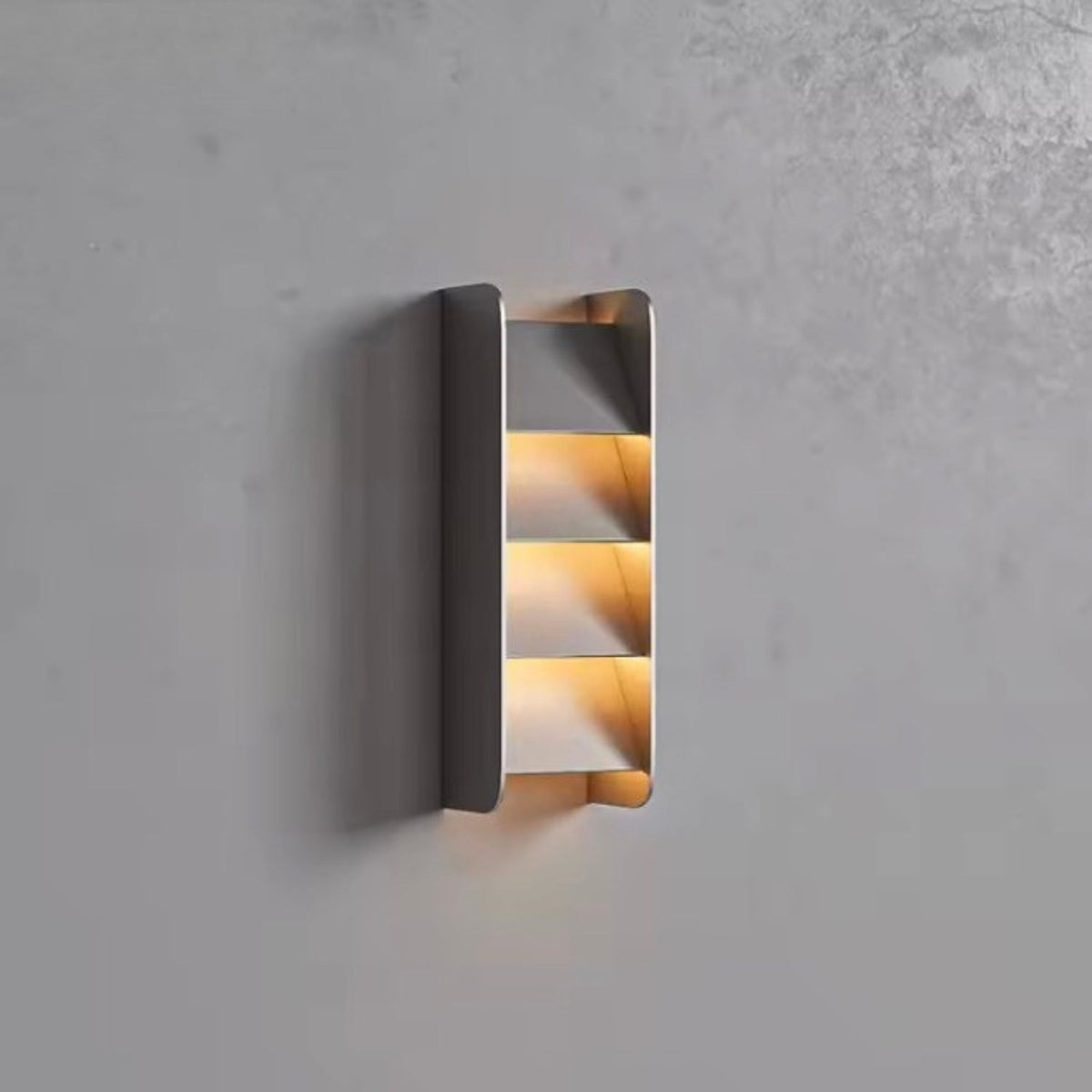 LED wall lamp featuring a sleek geometric design, crafted from durable stainless steel, ideal for hardwired installation in modern interiors, providing stylish lighting for contemporary spaces 2
