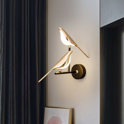 LED wall lamp featuring a unique golden bird design, providing warm ambient lighting perfect for modern indoor decor. 3