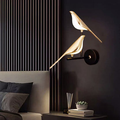 LED wall lamp featuring a unique golden bird design, providing warm ambient lighting perfect for modern indoor decor. 1