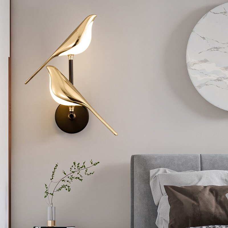 LED wall lamp featuring a unique golden bird design, providing warm ambient lighting perfect for modern indoor decor. 2