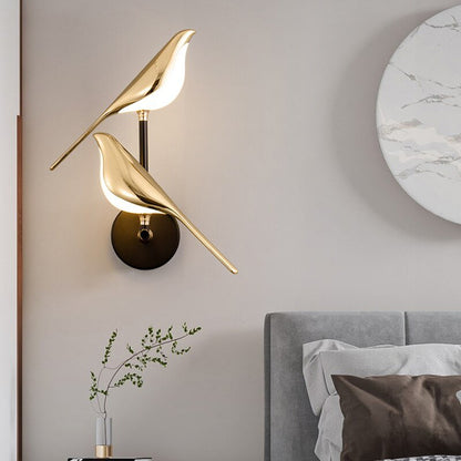 LED wall lamp featuring a unique golden bird design, providing warm ambient lighting perfect for modern indoor decor. 2