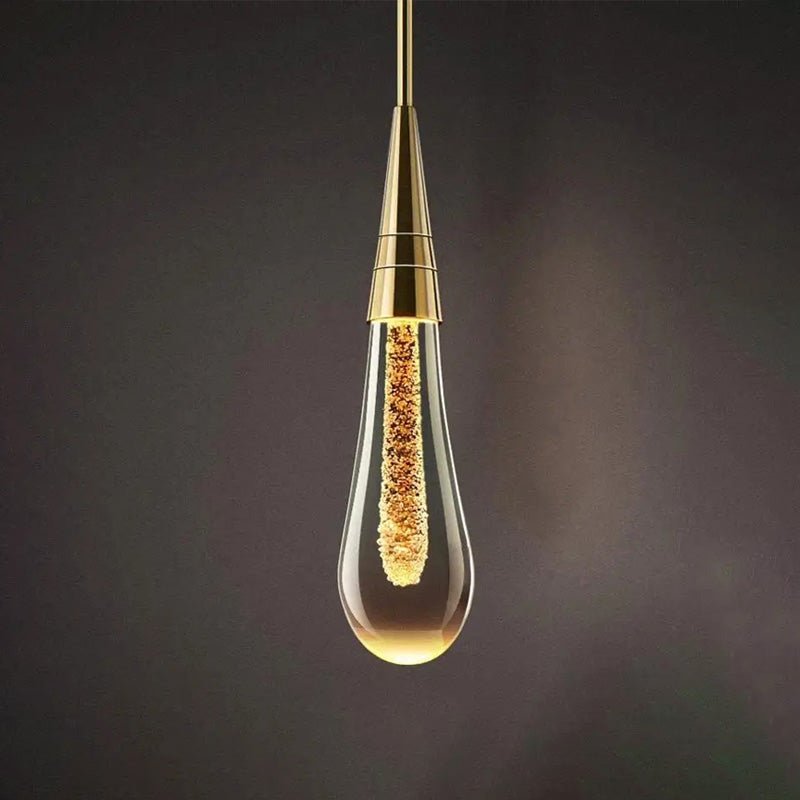 LED wall lamp featuring warm light and elegant gold accents, designed in a modern waterdrop shape with a combination of glass and metal materials, perfect for contemporary 3