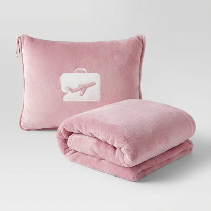 Lightweight travel set featuring a soft pillow and blanket, designed for comfort on the go with a compact and portable design. 4