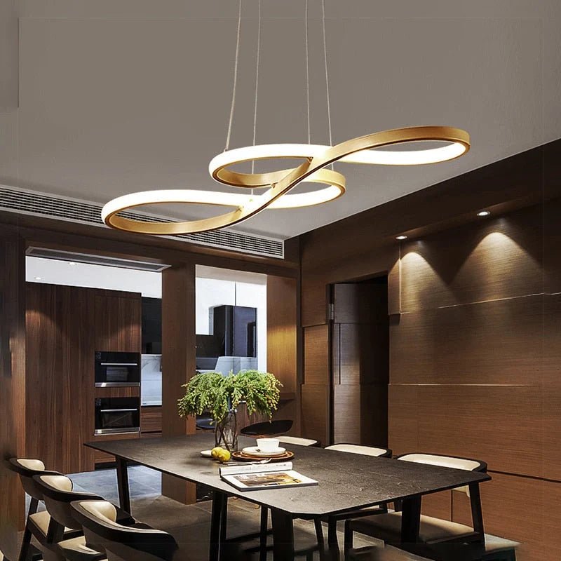 Modern black metal linear pendant light with adjustable cable, perfect for illuminating kitchens or living rooms. 3