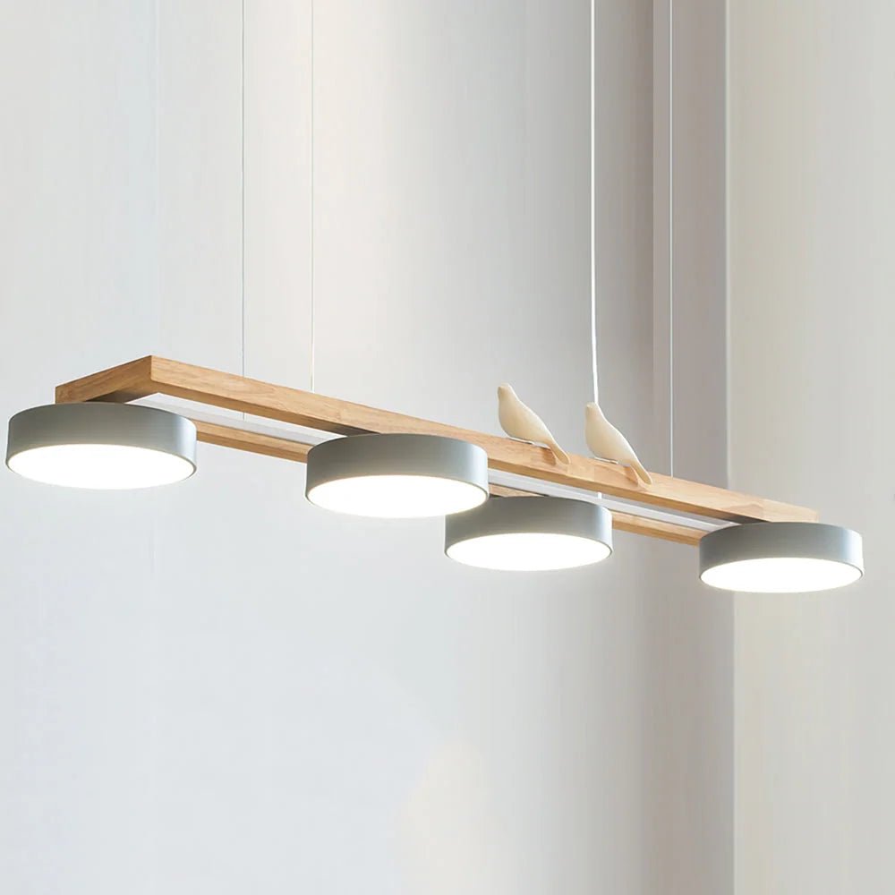 Modern linear pendant light featuring an adjustable cable and dimmable LED, ideal for kitchen islands, available in various finishes. 11
