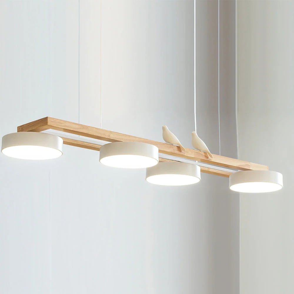 Modern linear pendant light featuring an adjustable cable and dimmable LED, ideal for kitchen islands, available in various finishes. 0
