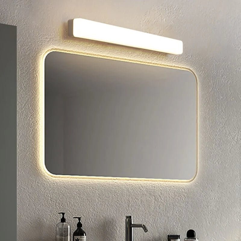 Linear wall light featuring an acrylic diffuser, designed for bathroom use, IP44 rated for moisture resistance, offering soft illumination in a sleek white finish. 6