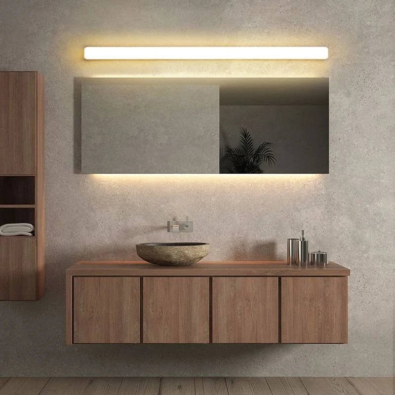 Linear wall light featuring an acrylic diffuser, designed for bathroom use, IP44 rated for moisture resistance, offering soft illumination in a sleek white finish. 4