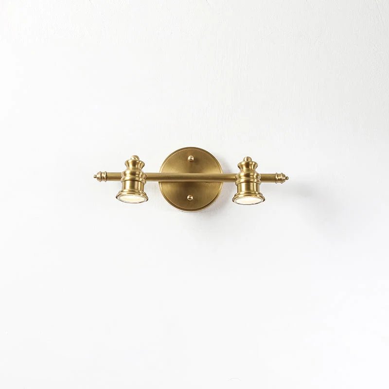 Linear wall light featuring adjustable spotlight heads in a warm brass finish, perfect for bathroom and indoor use, enhancing modern decor and providing focused illumination. 10