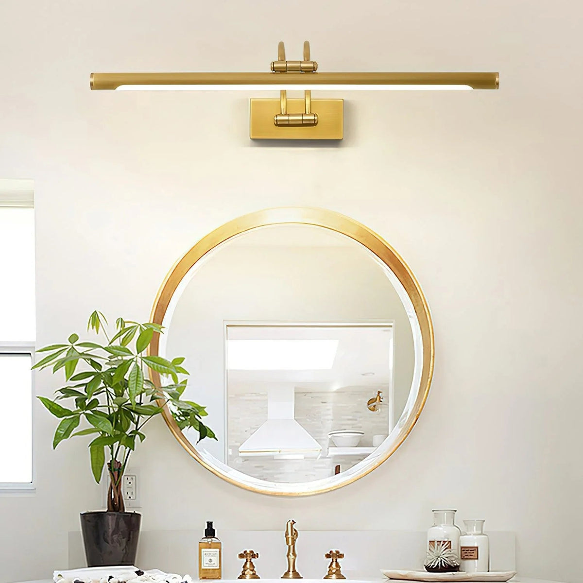 Linear wall light featuring a sleek design with a dimmable integrated LED, available in a modern brass or dark bronze finish, perfect for enhancing bathroom ambiance 3