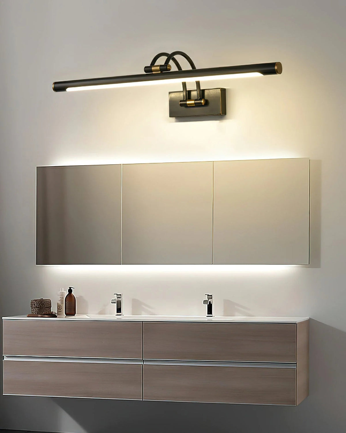 Linear wall light featuring a sleek design with a dimmable integrated LED, available in a modern brass or dark bronze finish, perfect for enhancing bathroom ambiance 9