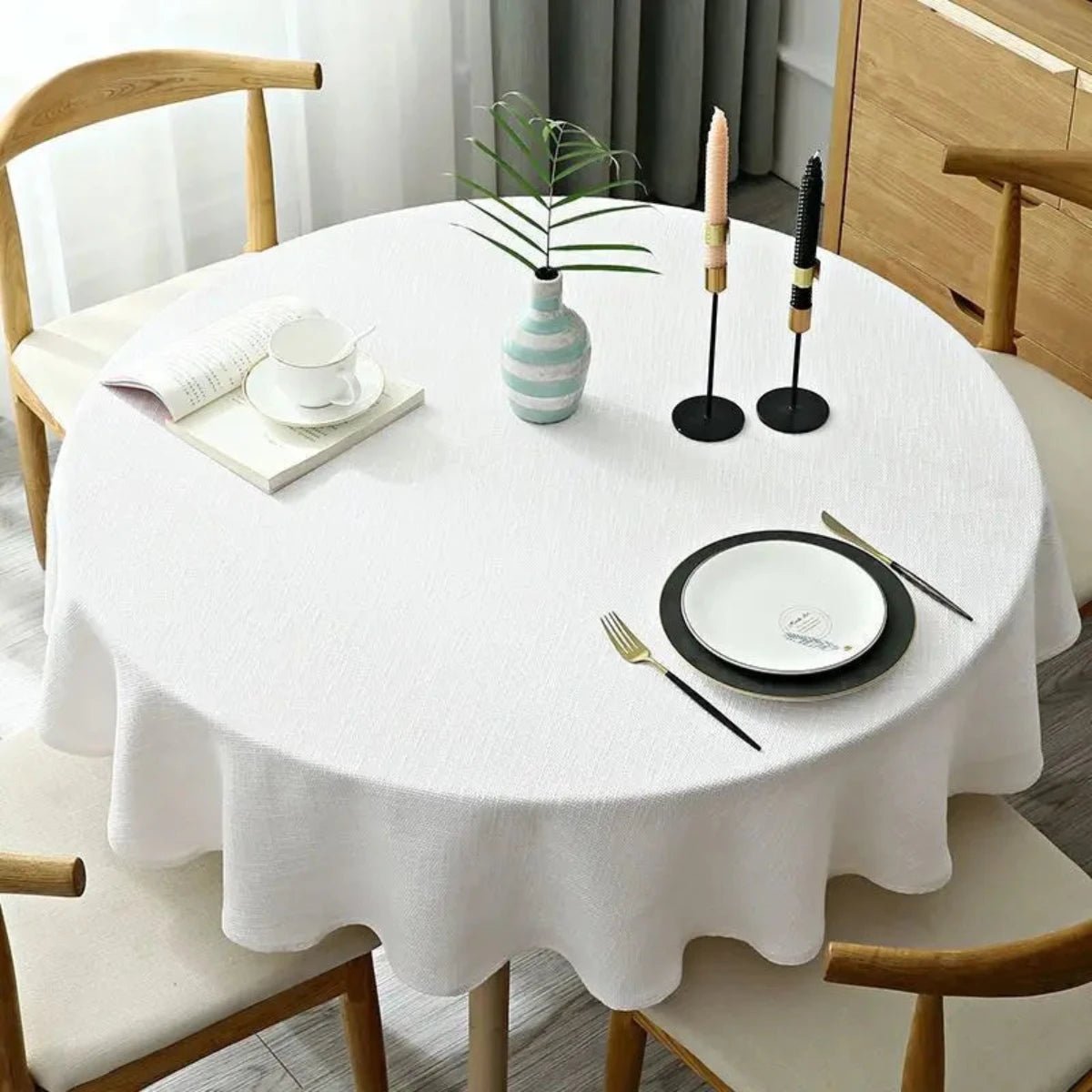 Linen tablecloth featuring a durable cotton blend, designed for easy maintenance, with a vibrant multi-color pattern, perfect for dining and special occasions. 2