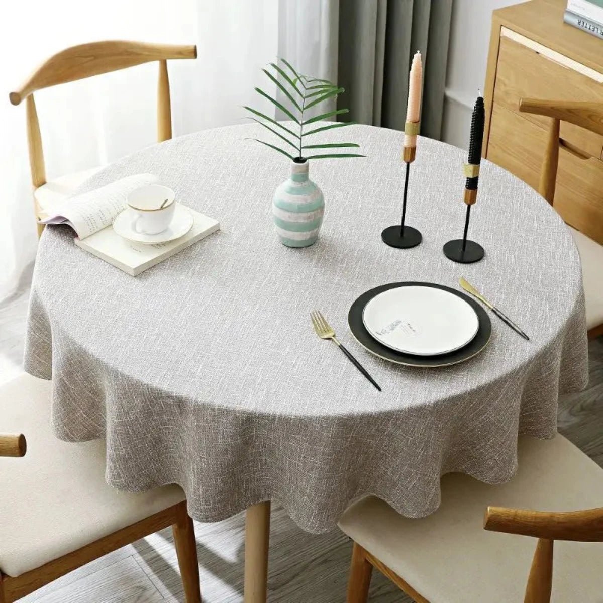 Linen tablecloth featuring a durable cotton blend, designed for easy maintenance, with a vibrant multi-color pattern, perfect for dining and special occasions. 0