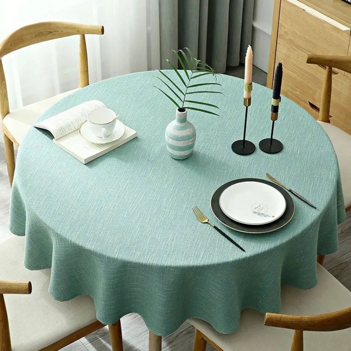 Linen tablecloth featuring a durable cotton blend, designed for easy maintenance, with a vibrant multi-color pattern, perfect for dining and special occasions. 7