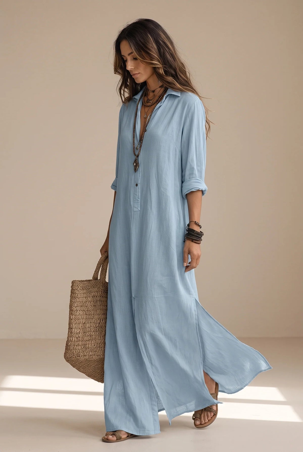 Long button-down shirt dress with adjustable collar in black and white, featuring a loose fit maxi design perfect for casual or semi-formal occasions. 12