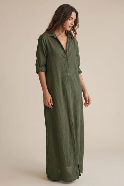 Long button-down shirt dress with adjustable collar in black and white, featuring a loose fit maxi design perfect for casual or semi-formal occasions. 11