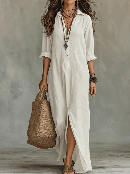 Loose black maxi dress featuring elegant buttons, designed for a flowing fit perfect for special occasions. 5
