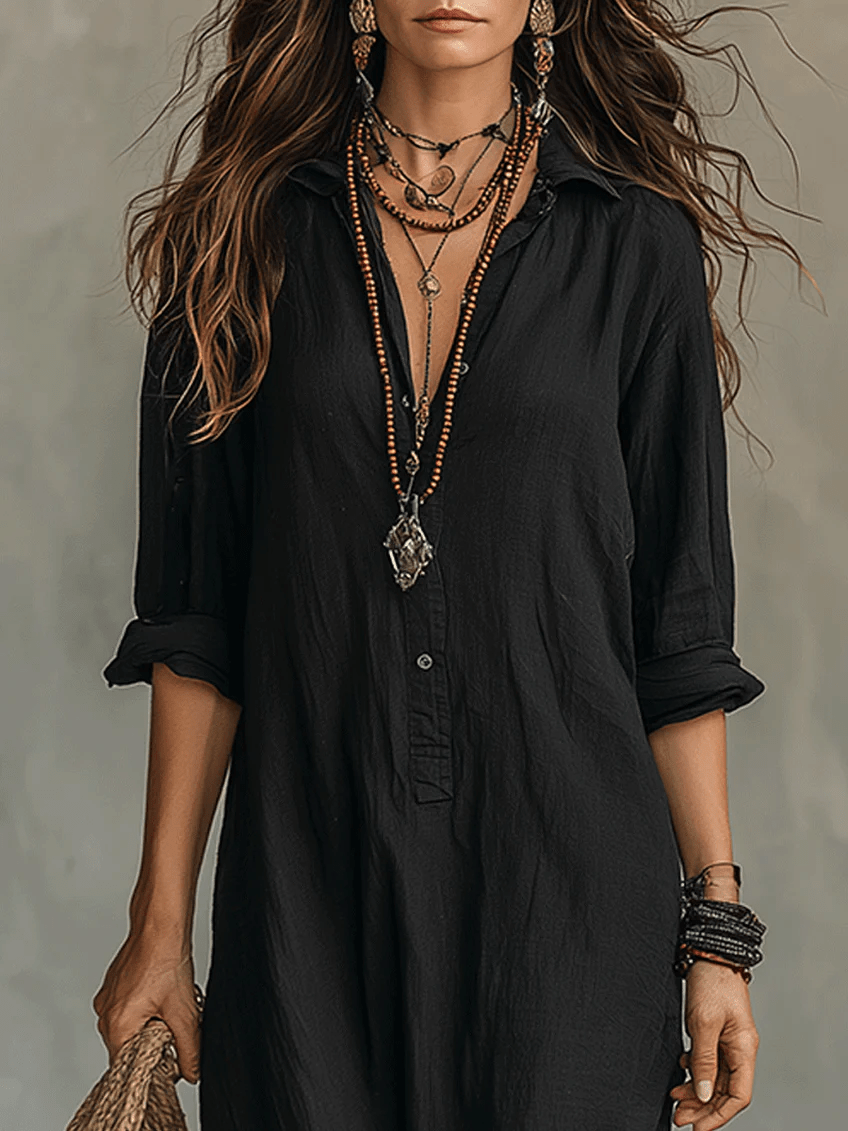 Loose black maxi dress featuring elegant buttons, designed for a flowing fit perfect for special occasions. 3