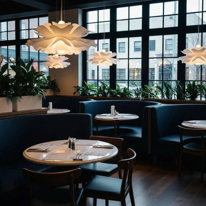 Lotus Pendant Light with adjustable cord, featuring a modern white acrylic design, perfect for illuminating kitchen and dining spaces. 7