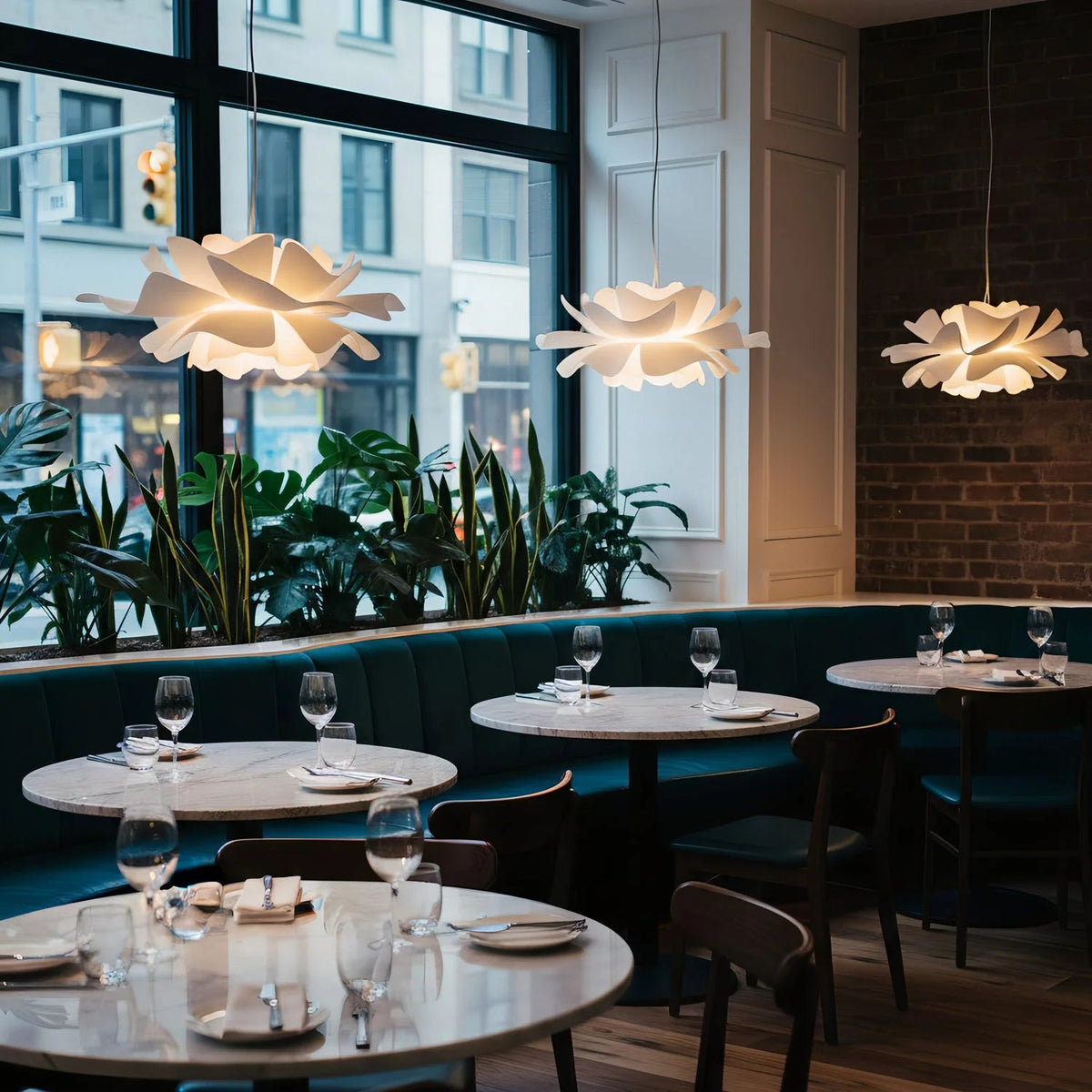 Lotus Pendant Light with adjustable cord, featuring a modern white acrylic design, perfect for illuminating kitchen and dining spaces. 8