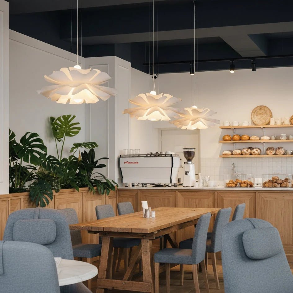 Lotus Pendant Light with adjustable cord, featuring a modern white acrylic design, perfect for illuminating kitchen and dining spaces. 6