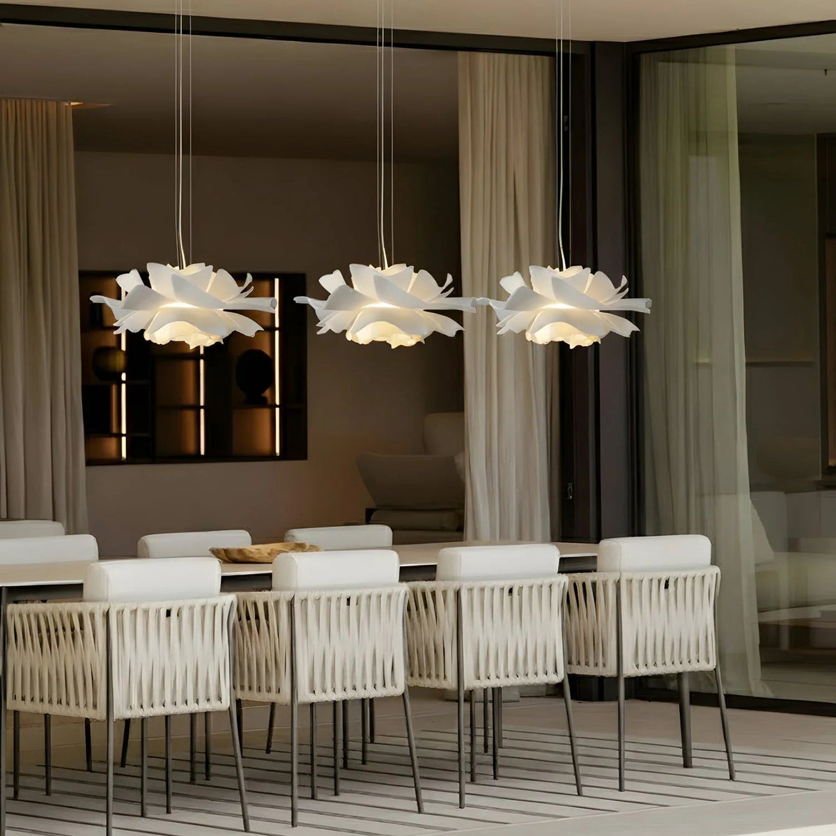 Lotus Pendant Light with adjustable cord, featuring a modern white acrylic design, perfect for illuminating kitchen and dining spaces. 4