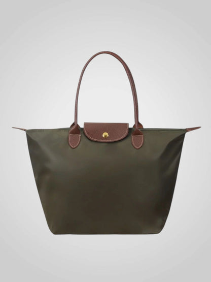 Luxury shoulder bag crafted from high-quality leather featuring a spacious interior and elegant design, perfect for everyday use. 10