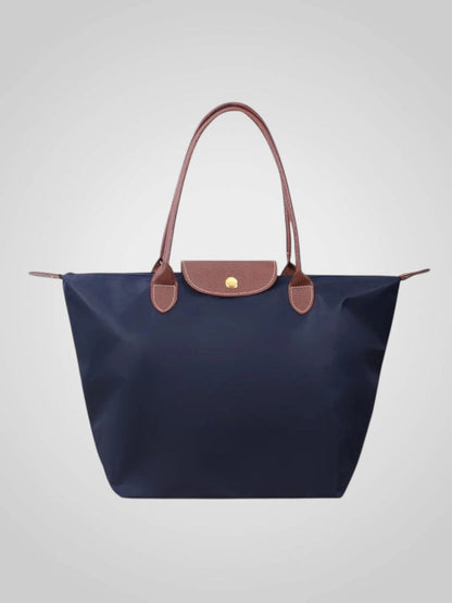 Luxury shoulder bag crafted from high-quality leather featuring a spacious interior and elegant design, perfect for everyday use. 8