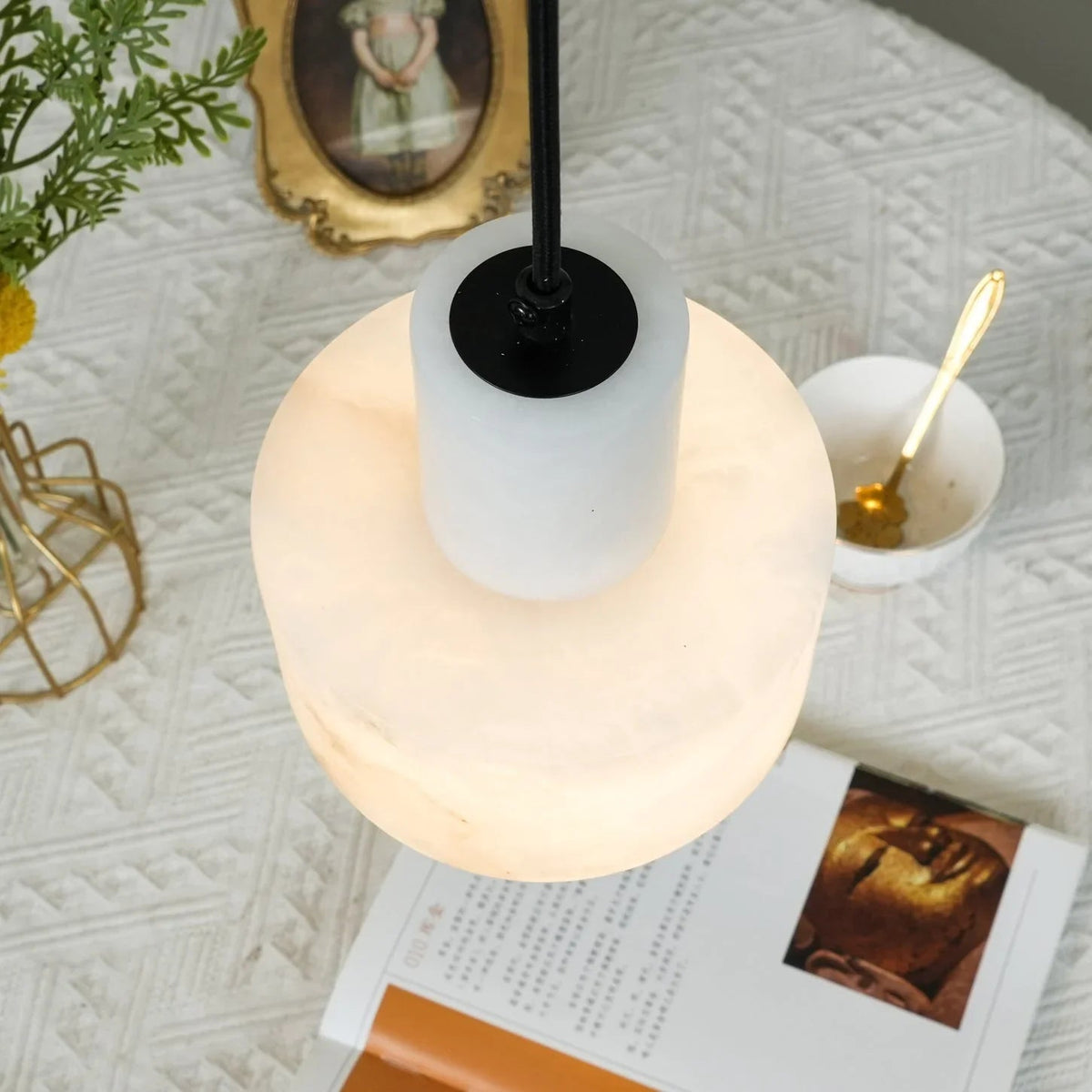 Modern minimalist marble pendant lamp featuring an integrated LED light, showcasing a sleek design that enhances any contemporary interior decor. 2