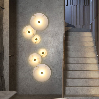 Modern marble wall lamp featuring integrated LED lighting, available in elegant gold or black copper finish, perfect for contemporary interior decor. 1
