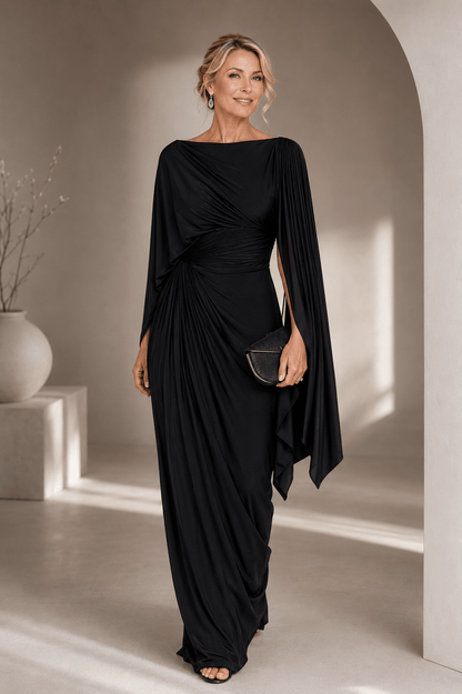 Elegant maxi dress featuring flowing cape sleeves and a ruched waist, perfect for formal occasions. 1