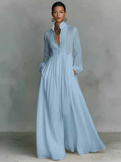 Maxi dress featuring a stylish patchwork linen design, elegant stand-up collar, and convenient button closure, perfect for casual or semi-formal occasions. 2