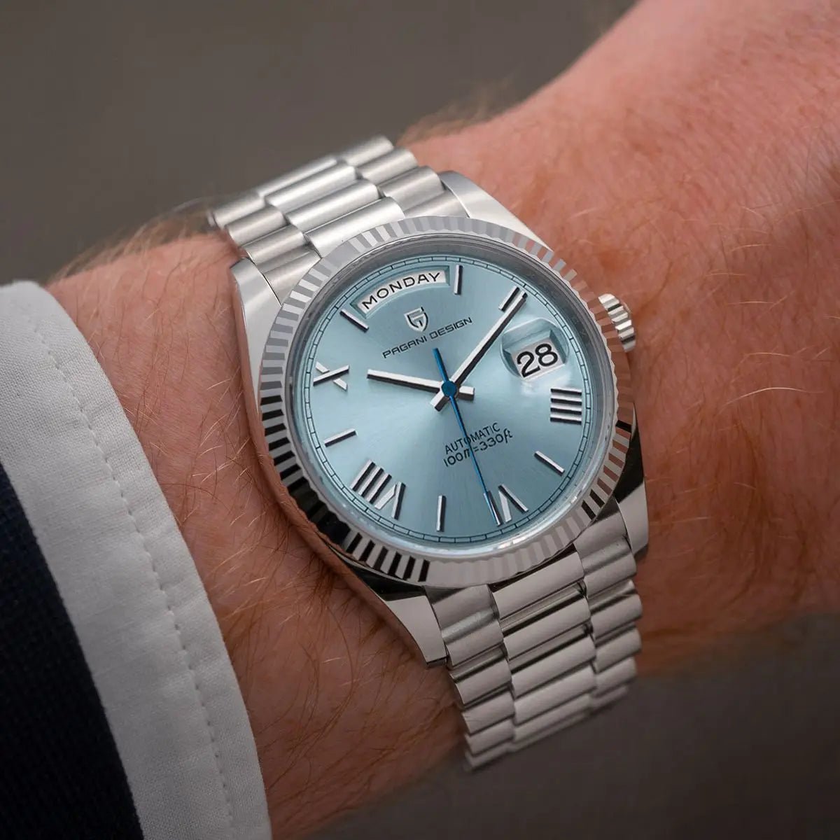 Men's automatic watch featuring a date display, crafted from brushed stainless steel, showcasing an elegant design suitable for both work and casual wear. 2