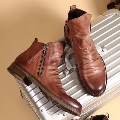 Men's Chelsea boots featuring a durable leather design, ideal versatile footwear for both casual and formal occasions. 1