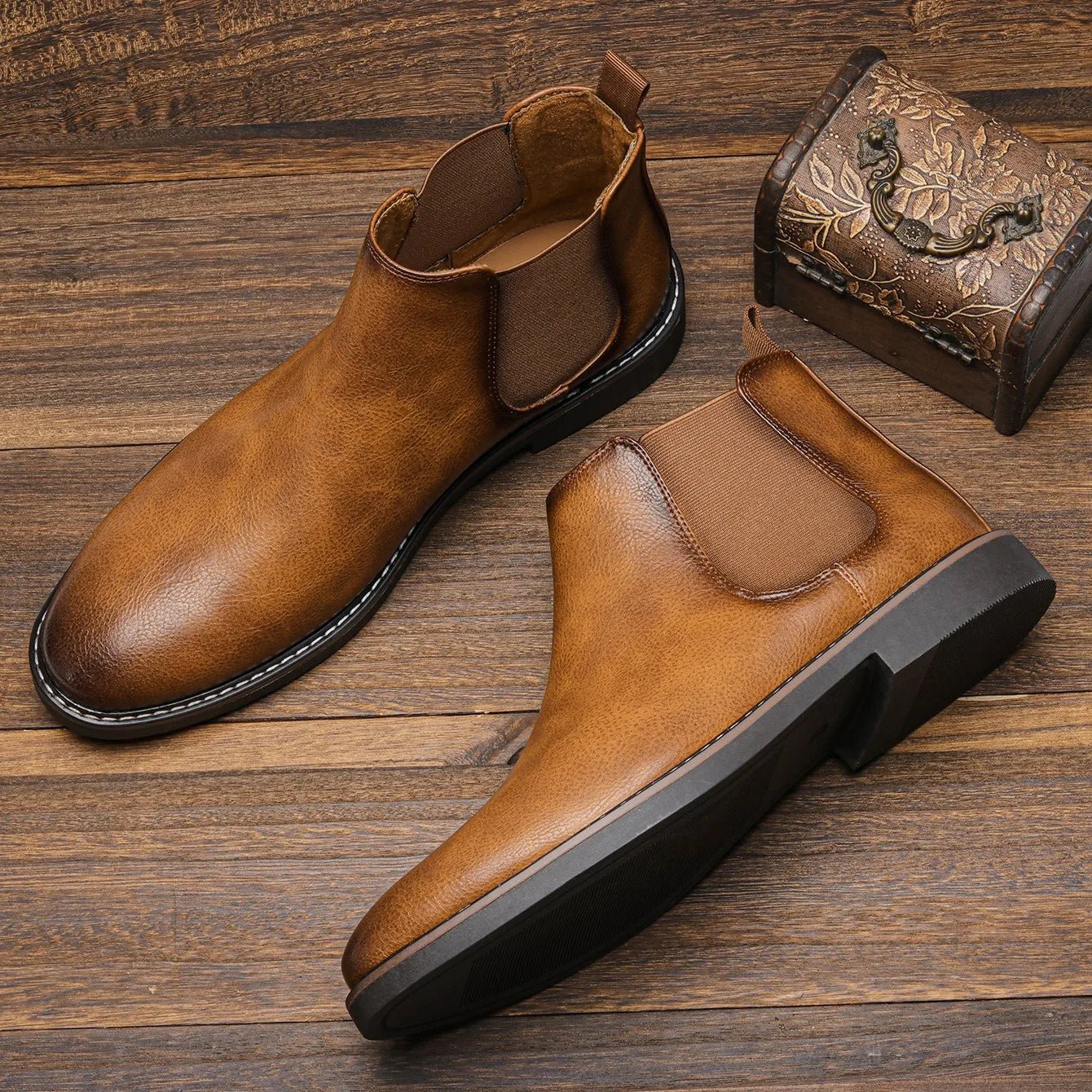 Men's Chelsea boots featuring a classic genuine leather design, elastic side panel for easy wear, and a sturdy rubber sole for durability and comfort. 0
