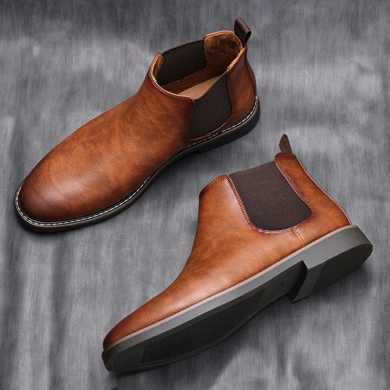 Men's Chelsea boots featuring a classic genuine leather design, elastic side panel for easy wear, and a sturdy rubber sole for durability and comfort. 3